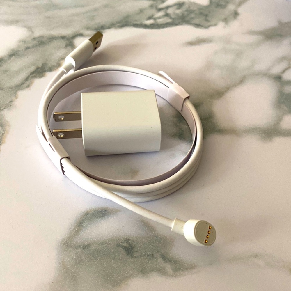 Original Google nest camera charger, usb charger and a connector cable.
